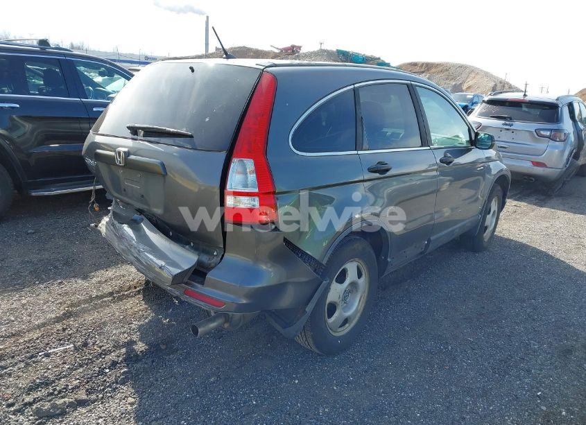 Photo 4 of 2011 Honda Cr-v LX (VIN 5J6RE3H39BL057429)