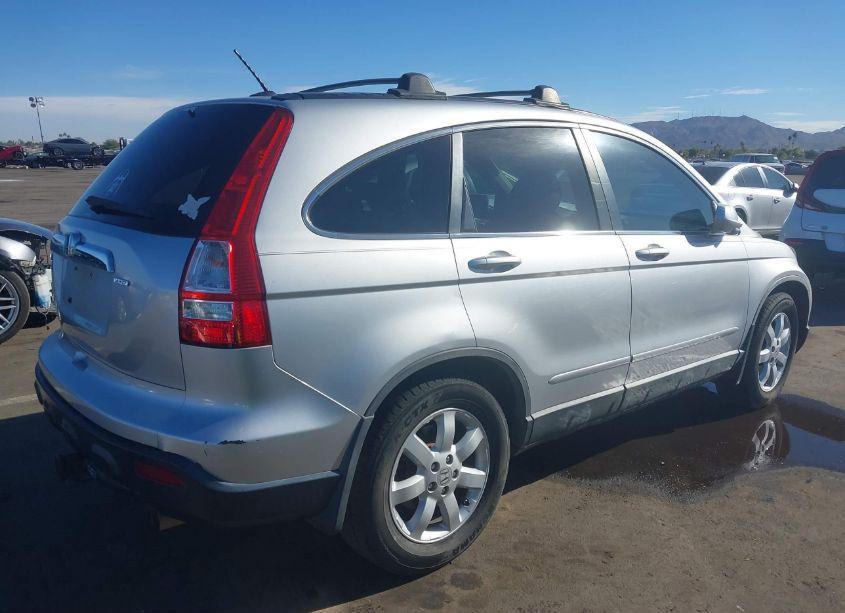 Photo 4 of 2009 Honda Cr-v EX-L (VIN 5J6RE487X9L069060)