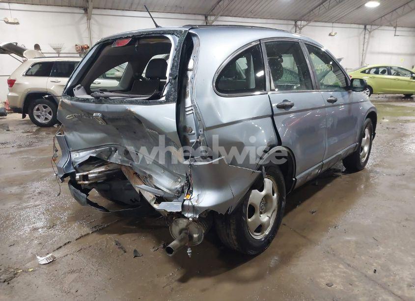 Photo 4 of 2010 Honda Cr-v LX (VIN 5J6RE4H34AL035858)