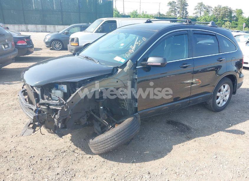 Photo 2 of 2010 Honda Cr-v LX (VIN 5J6RE4H3XAL083557)