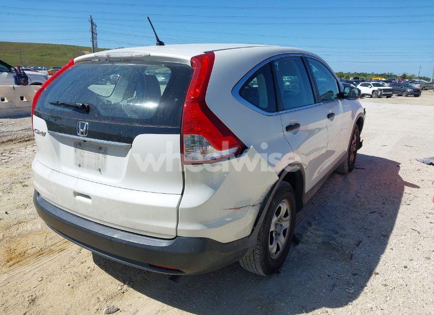 Photo 4 of 2014 Honda Cr-v LX (VIN 5J6RM3H32EL039572)