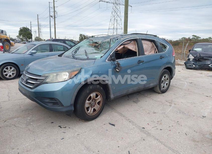 Photo 2 of 2014 Honda Cr-v LX (VIN 5J6RM3H38EL023831)