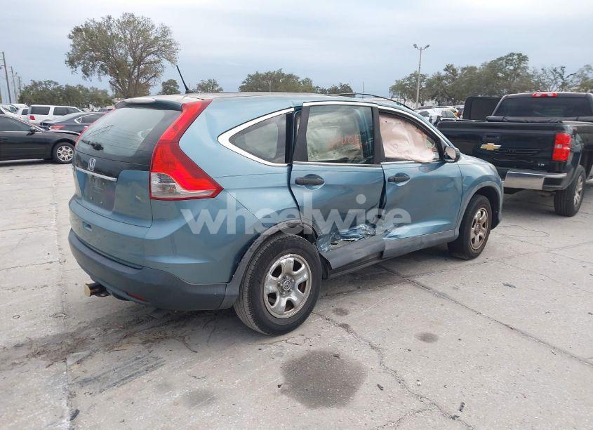 Photo 4 of 2014 Honda Cr-v LX (VIN 5J6RM3H38EL023831)