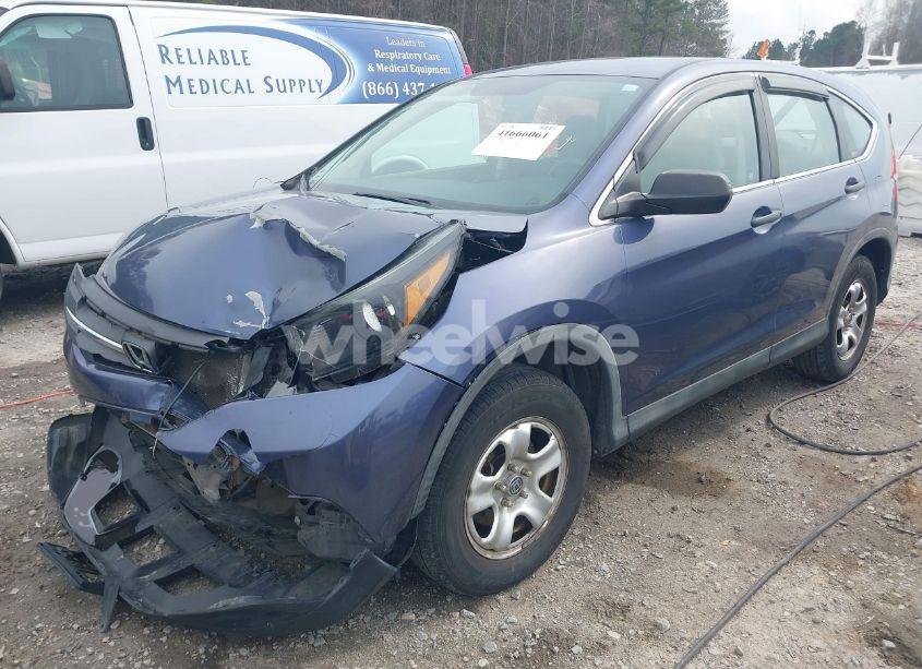 Photo 2 of 2012 Honda Cr-v LX (VIN 5J6RM3H3XCL038019)