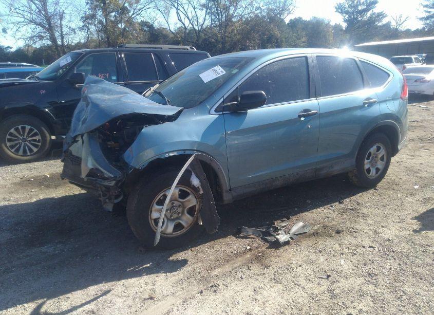 Photo 2 of 2014 Honda Cr-v LX (VIN 5J6RM3H3XEL023877)