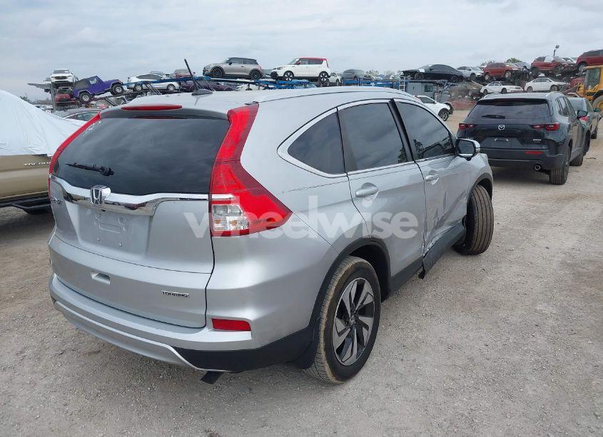 Photo 4 of 2016 Honda Cr-v TOURING (VIN 5J6RM3H92GL011231)