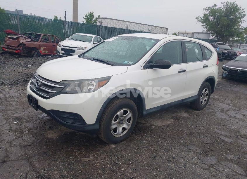 Photo 2 of 2014 Honda Cr-v LX (VIN 5J6RM4H30EL113299)