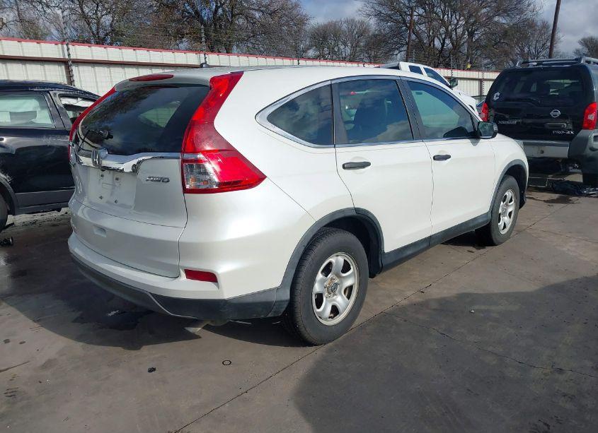 Photo 4 of 2015 Honda Cr-v LX (VIN 5J6RM4H30FL022521)