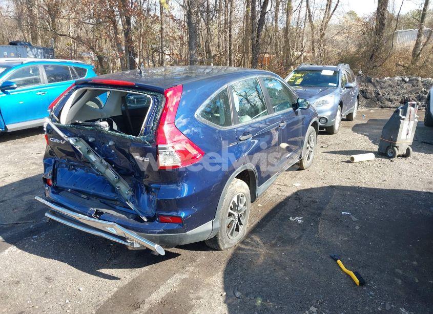 Photo 4 of 2015 Honda Cr-v LX (VIN 5J6RM4H30FL094576)