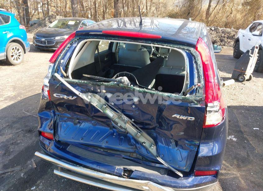 Photo 6 of 2015 Honda Cr-v LX (VIN 5J6RM4H30FL094576)