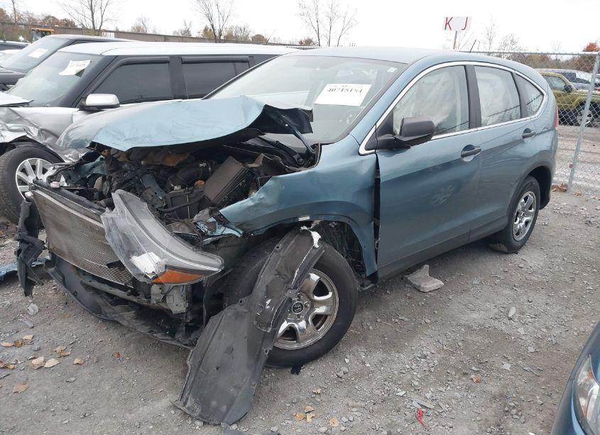 Photo 2 of 2014 Honda Cr-v LX (VIN 5J6RM4H31EL025474)