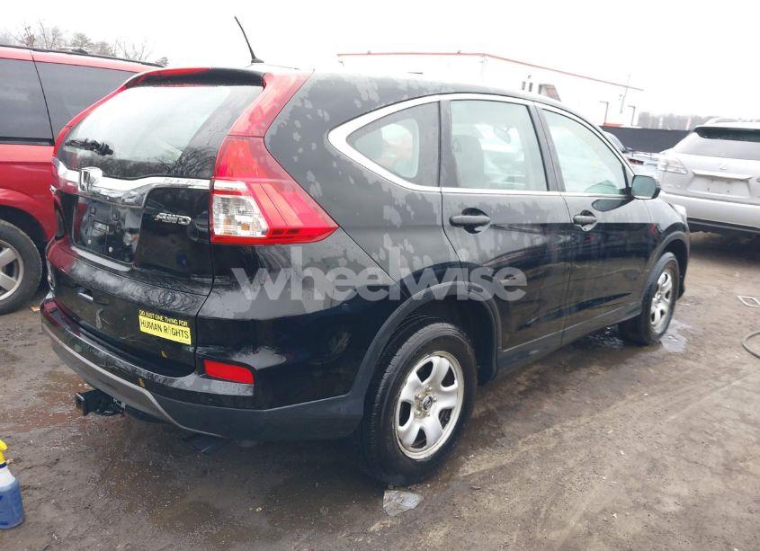 Photo 4 of 2015 Honda Cr-v LX (VIN 5J6RM4H31FL067564)