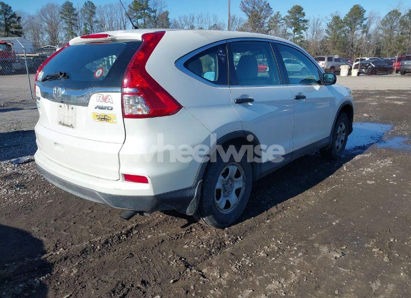 Photo 4 of 2016 Honda Cr-v LX (VIN 5J6RM4H31GL001324)