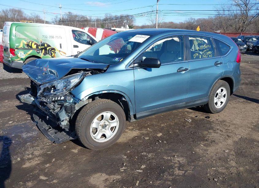 Photo 2 of 2015 Honda Cr-v LX (VIN 5J6RM4H33FL024800)