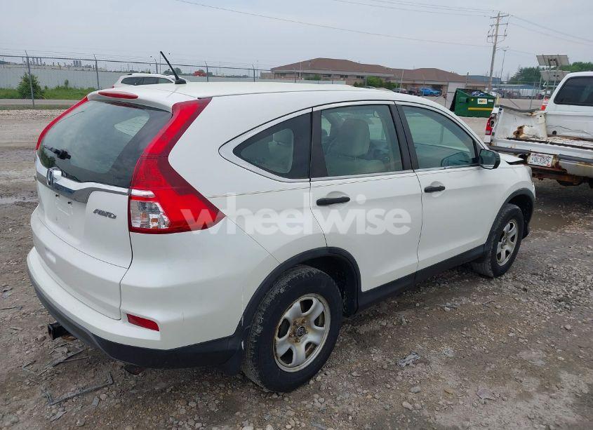 Photo 4 of 2015 Honda Cr-v LX (VIN 5J6RM4H33FL106929)