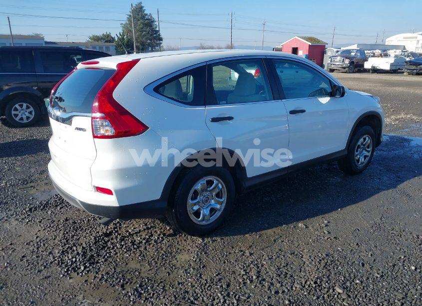 Photo 4 of 2016 Honda Cr-v LX (VIN 5J6RM4H33GL009893)