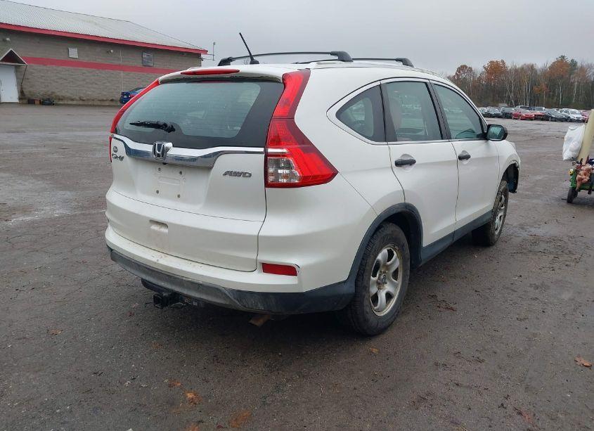 Photo 4 of 2015 Honda Cr-v LX (VIN 5J6RM4H34FL014695)
