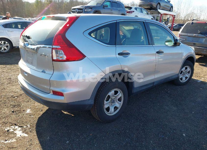 Photo 4 of 2015 Honda Cr-v LX (VIN 5J6RM4H34FL039788)