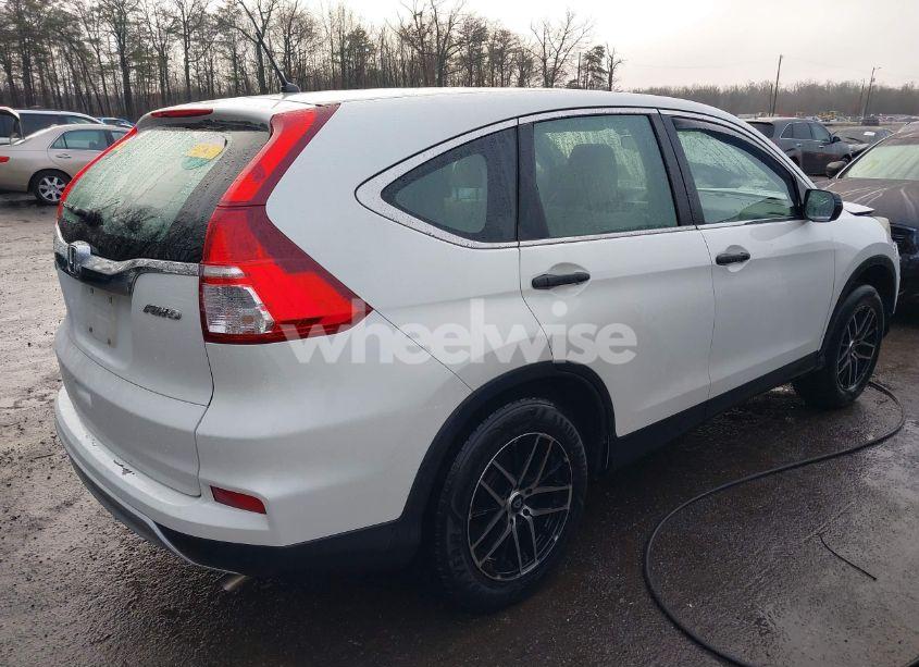 Photo 4 of 2015 Honda Cr-v LX (VIN 5J6RM4H35FL021445)