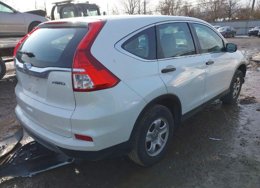 Photo 4 of 2015 Honda Cr-v LX (VIN 5J6RM4H35FL025723)