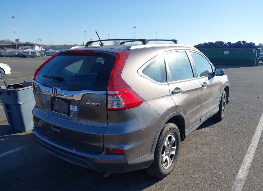 Photo 4 of 2015 Honda Cr-v LX (VIN 5J6RM4H35FL094475)
