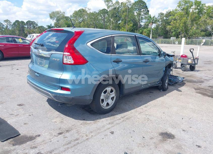 Photo 4 of 2015 Honda Cr-v LX (VIN 5J6RM4H35FL129872)