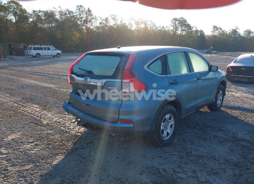 Photo 4 of 2015 Honda Cr-v LX (VIN 5J6RM4H36FL017484)