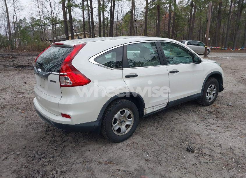 Photo 4 of 2015 Honda Cr-v LX (VIN 5J6RM4H36FL023141)