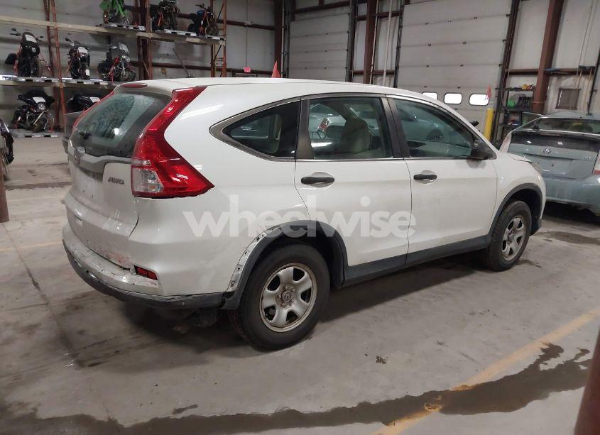Photo 4 of 2016 Honda Cr-v LX (VIN 5J6RM4H36GL019849)