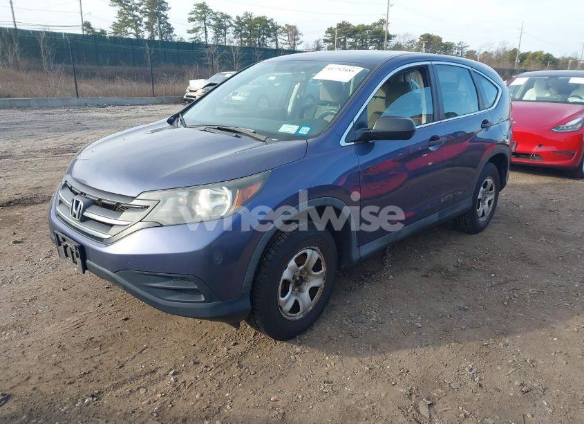 Photo 2 of 2012 Honda Cr-v LX (VIN 5J6RM4H37CL060680)