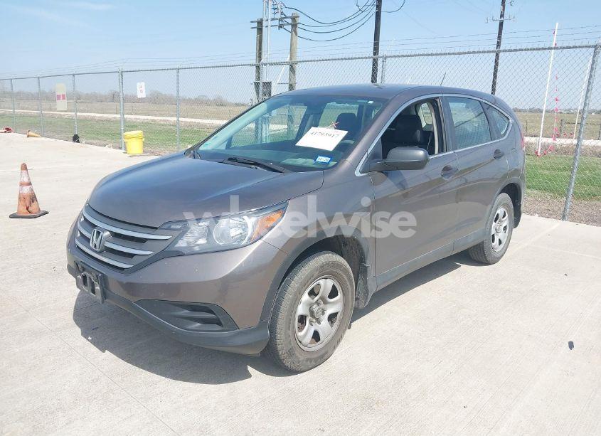 Photo 2 of 2014 Honda Cr-v LX (VIN 5J6RM4H37EL033899)