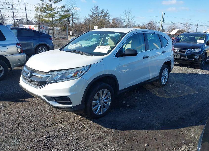 Photo 2 of 2015 Honda Cr-v LX (VIN 5J6RM4H37FL016358)