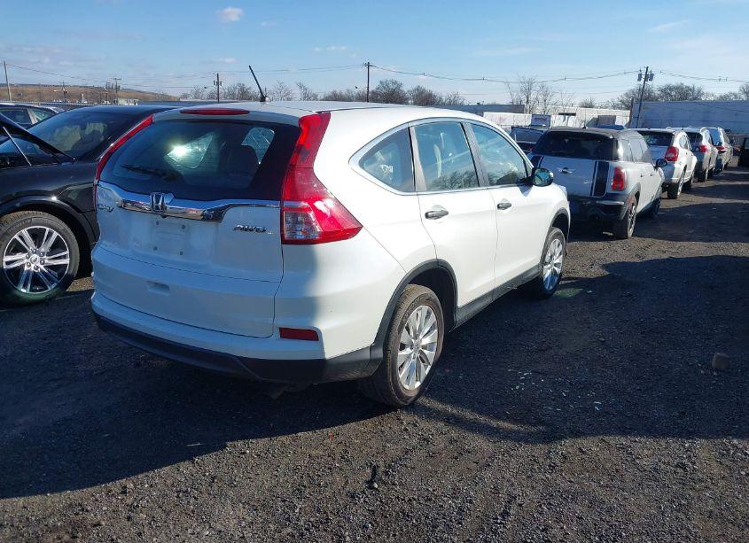 Photo 4 of 2015 Honda Cr-v LX (VIN 5J6RM4H37FL016358)