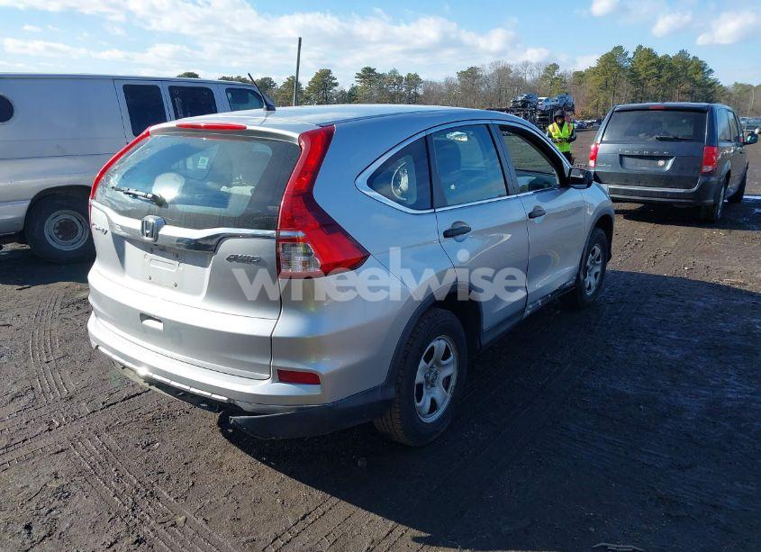 Photo 4 of 2015 Honda Cr-v LX (VIN 5J6RM4H37FL077418)