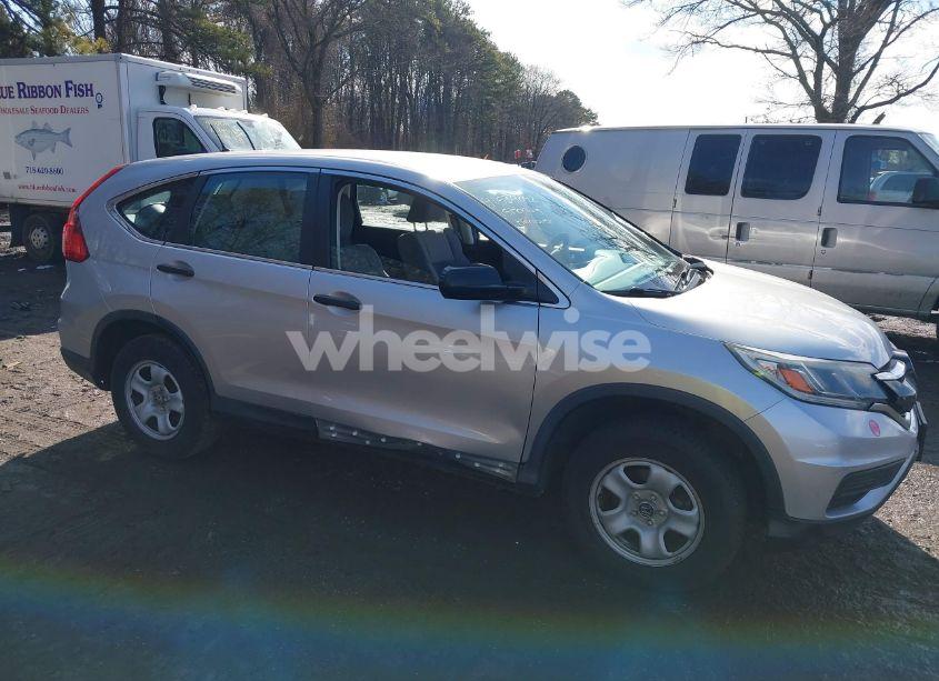 Photo 6 of 2015 Honda Cr-v LX (VIN 5J6RM4H37FL077418)