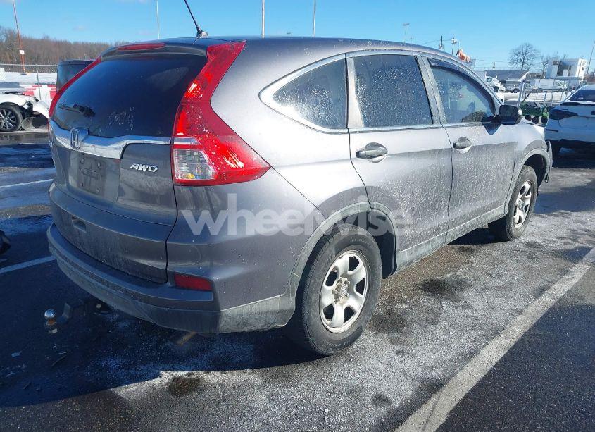 Photo 4 of 2015 Honda Cr-v LX (VIN 5J6RM4H38FL006096)