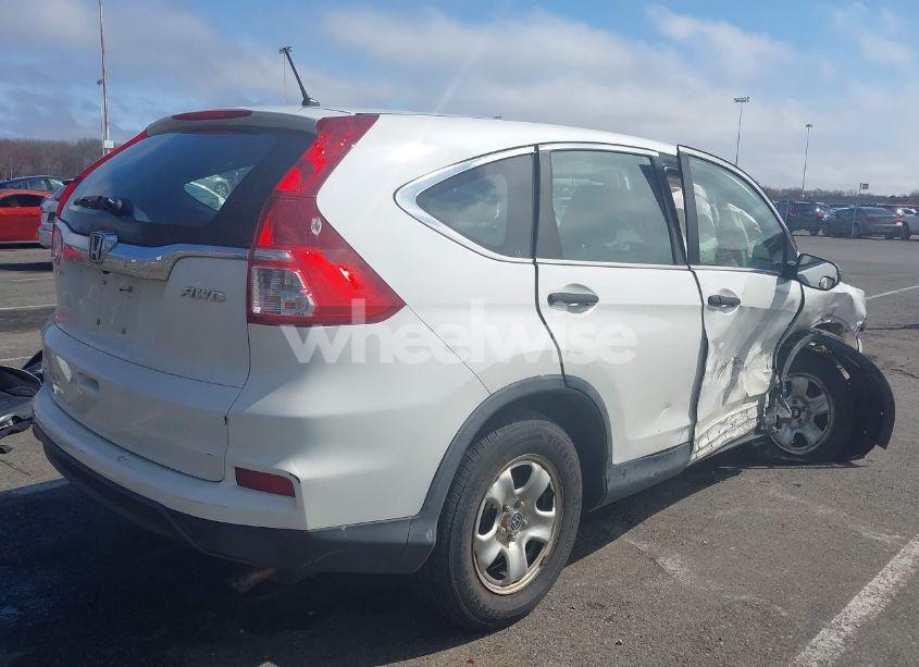 Photo 4 of 2015 Honda Cr-v LX (VIN 5J6RM4H38FL058912)