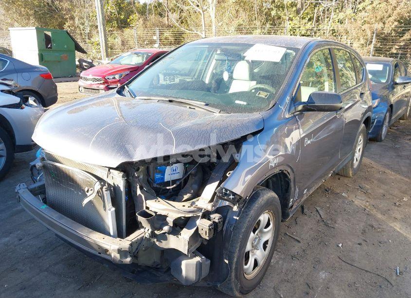 Photo 2 of 2016 Honda Cr-v LX (VIN 5J6RM4H38GL133299)