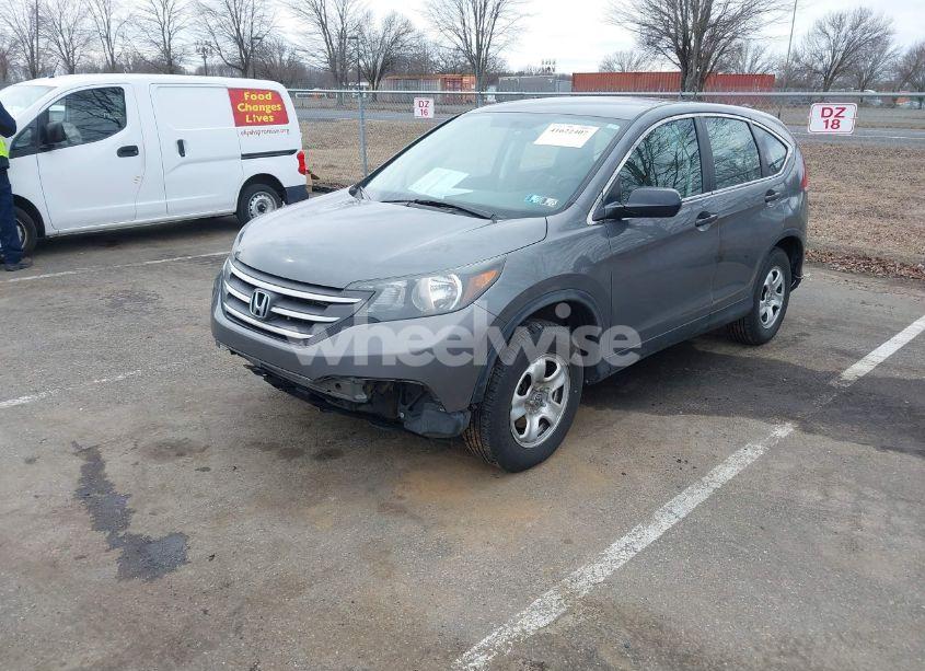 Photo 2 of 2014 Honda Cr-v LX (VIN 5J6RM4H39EL052888)