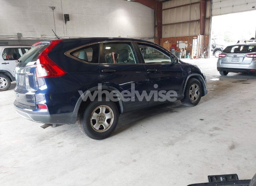 Photo 4 of 2015 Honda Cr-v LX (VIN 5J6RM4H39FL068946)