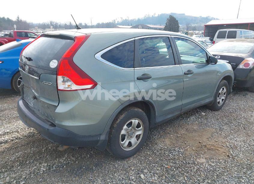 Photo 4 of 2012 Honda Cr-v LX (VIN 5J6RM4H3XCL049978)