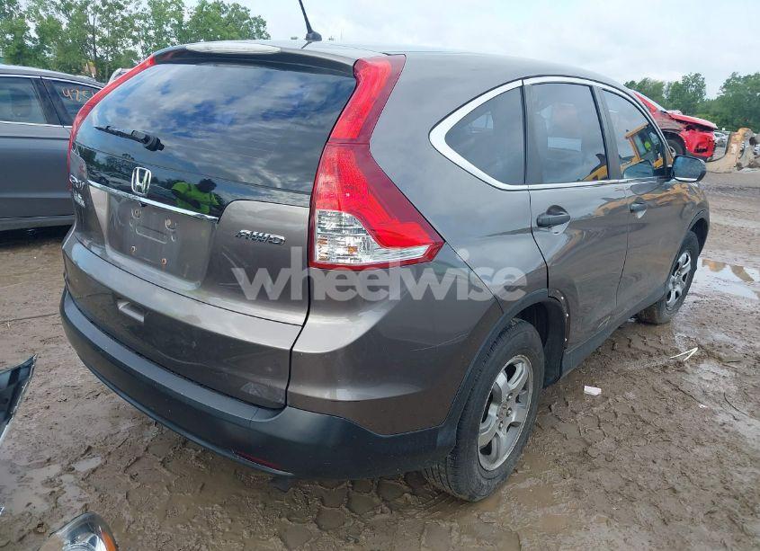 Photo 4 of 2014 Honda Cr-v LX (VIN 5J6RM4H3XEL013386)