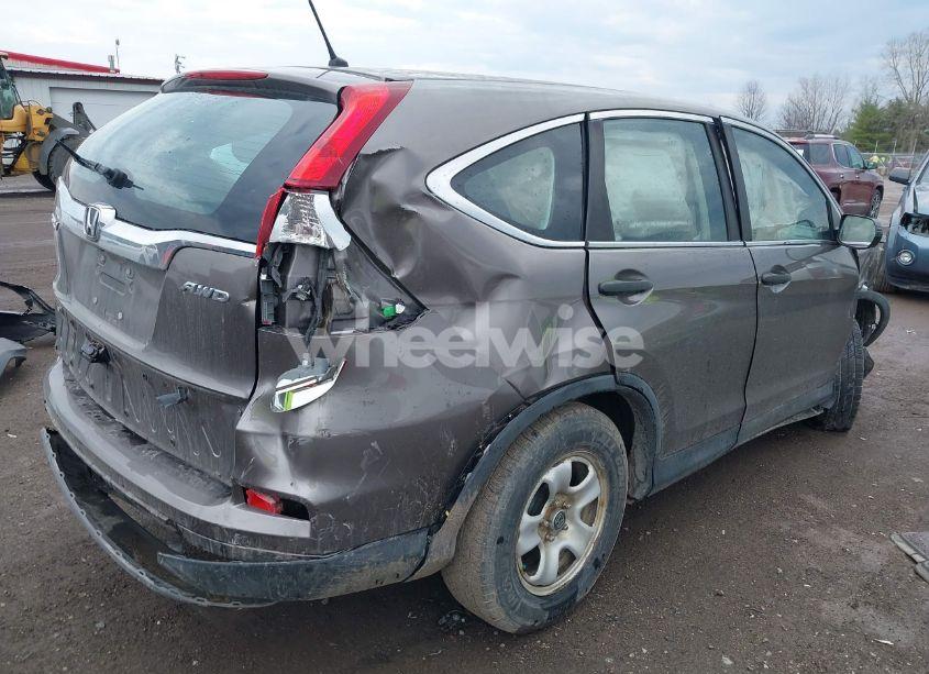 Photo 4 of 2015 Honda Cr-v LX (VIN 5J6RM4H3XFL094438)