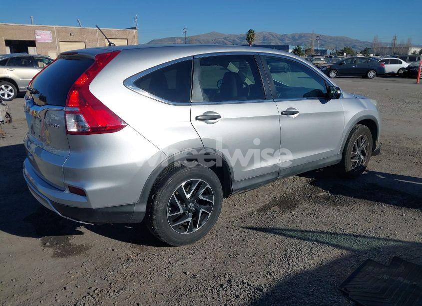 Photo 4 of 2016 Honda Cr-v (VIN 5J6RM4H45GL082451)