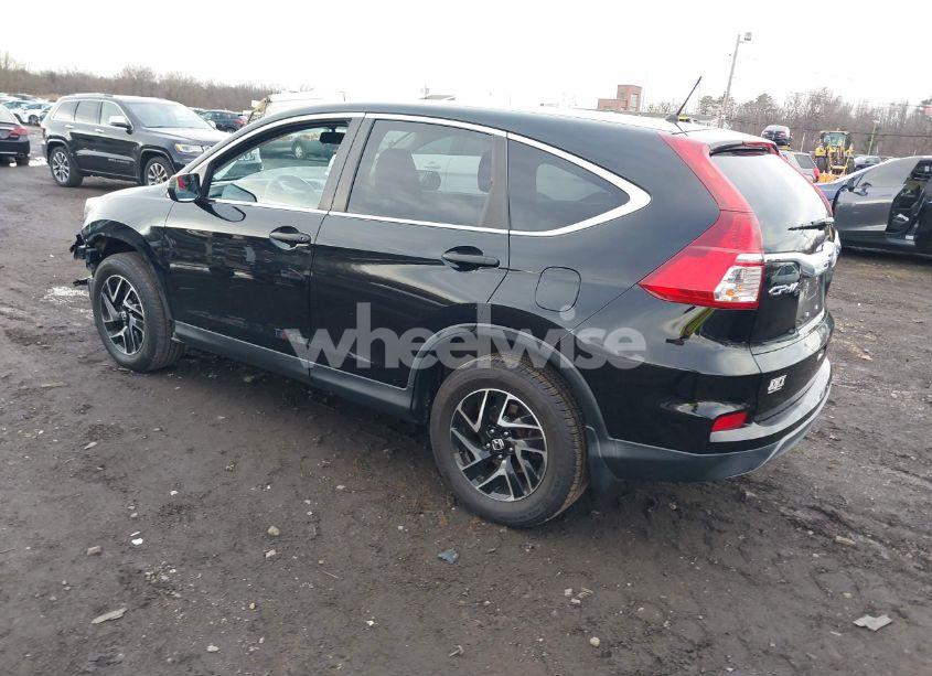 Photo 3 of 2016 Honda Cr-v SE (VIN 5J6RM4H4XGL023749)
