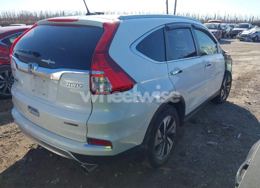 Photo 4 of 2016 Honda Cr-v TOURING (VIN 5J6RM4H97GL007150)