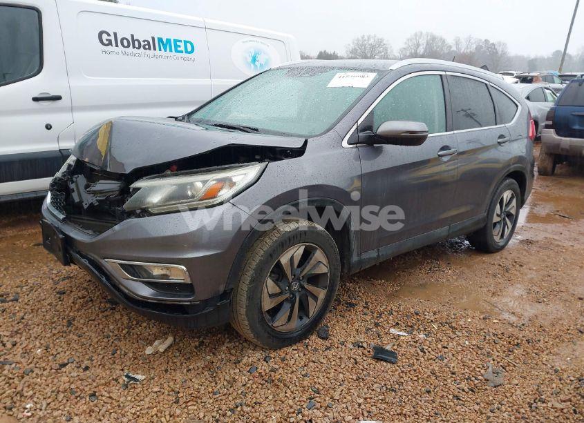 Photo 2 of 2016 Honda Cr-v TOURING (VIN 5J6RM4H97GL071804)