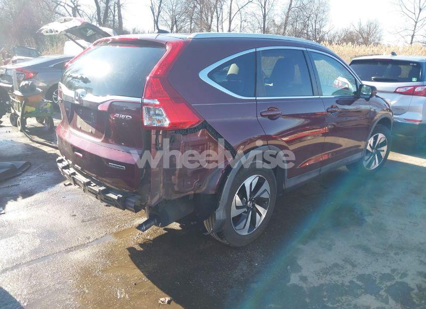 Photo 4 of 2016 Honda Cr-v TOURING (VIN 5J6RM4H99GL118167)