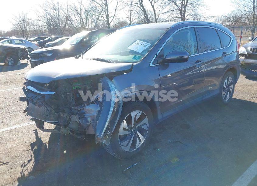 Photo 2 of 2016 Honda Cr-v TOURING (VIN 5J6RM4H9XGL036657)