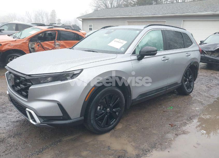 Photo 2 of 2023 Honda Cr-v HYBRID SPORT TOURING (VIN 5J6RS6H91PL005234)
